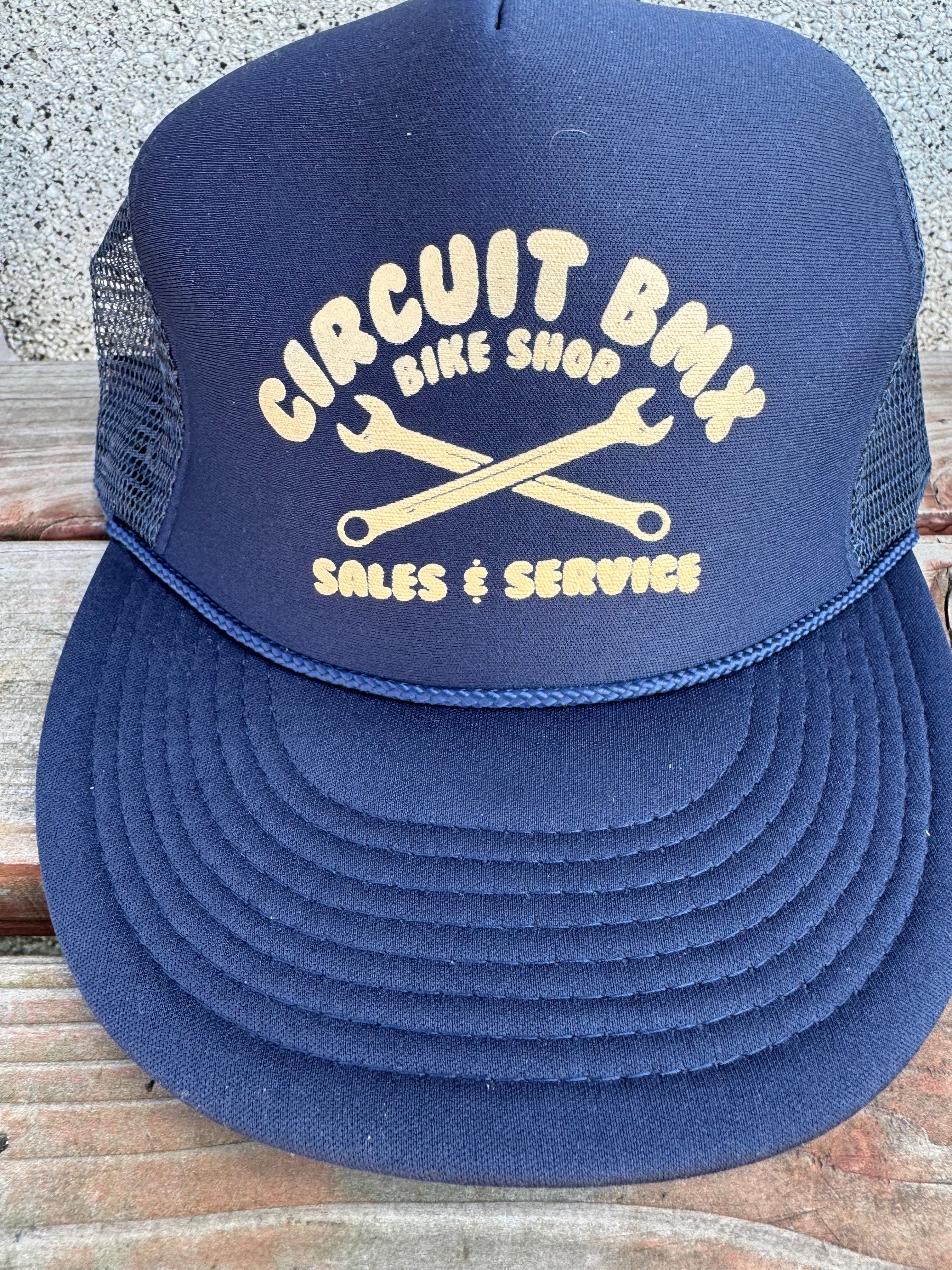 Circuit “Shop” Trucker Hat